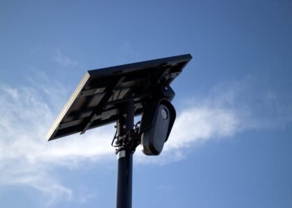 Motorized solar panel tilt mount shown from below, illustrating adjustable tracking hardware for optimizing solar energy collection.