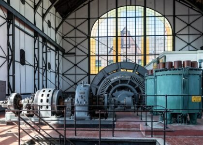 Industrial generator equipment inside a historic building, illustrating generator technology for an article on portable vs inverter generators.