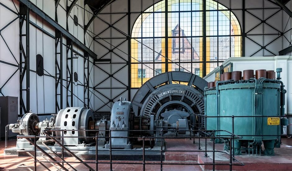 Industrial generator equipment inside a historic building, illustrating generator technology for an article on portable vs inverter generators.