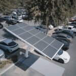 solar-powered carport charging an electric vehicle in a parking lot, illustrating solar charge controller use for lithium batteries
