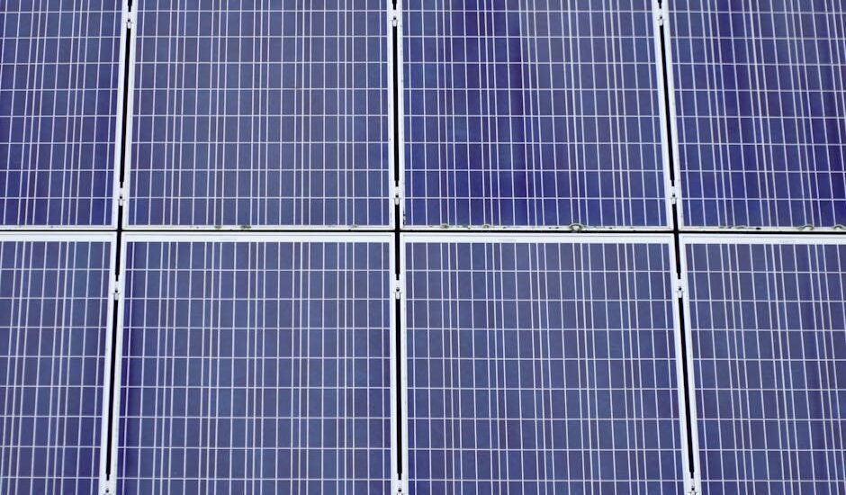 Close-up view of several blue solar panels, illustrating a key component of off-grid power systems for troubleshooting guides.