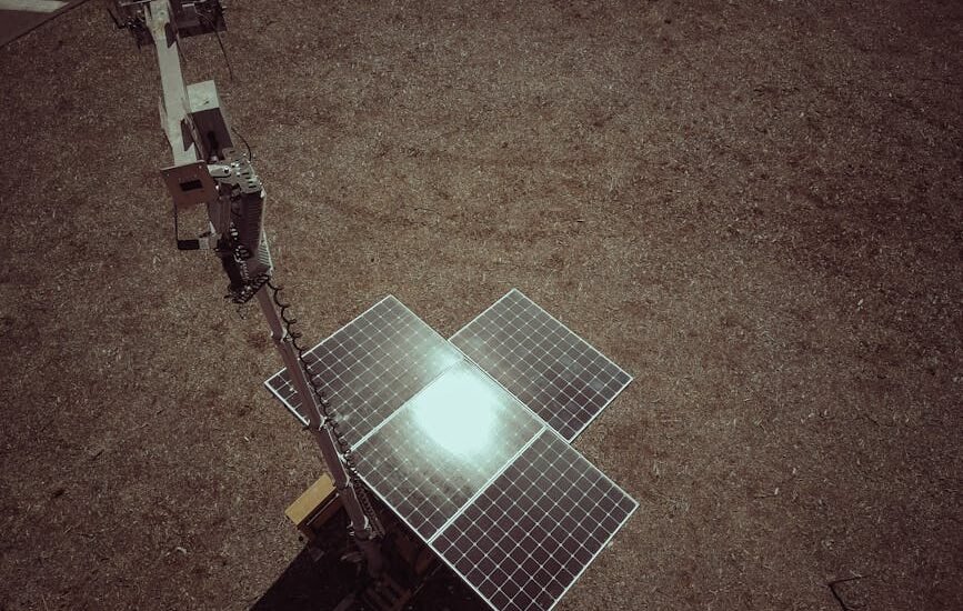 A ground-mounted solar panel array in a dry, open area, illustrating solar generator options for off-grid power needs.