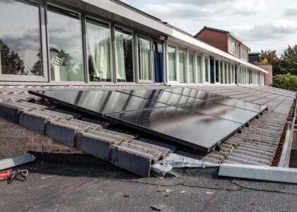 Solar panels mounted at an angle on a residential tiled roof, illustrating the importance of tilt angle for solar efficiency.