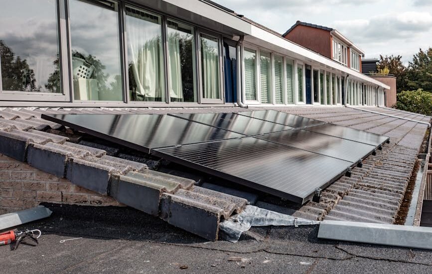 Solar panels mounted at an angle on a residential tiled roof, illustrating the importance of tilt angle for solar efficiency.