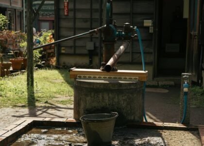 A traditional water pump setup, illustrating a practical example of water pumps for off-grid living.