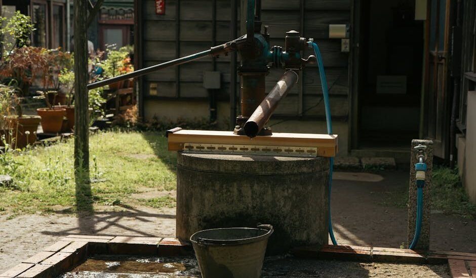 A traditional water pump setup, illustrating a practical example of water pumps for off-grid living.