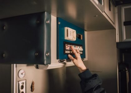 A person using a battery disconnect switch, relevant to battery disconnect switches topic.