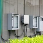 Image of outdoor solar battery enclosures mounted on a wall, relevant to solar battery enclosure selection.