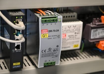 A DC to DC converter and related components in a power system setup.