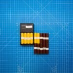 Image showing battery cells in a case, relevant to floating charge in off-grid power.