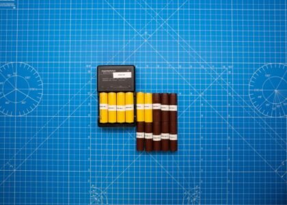 Image showing battery cells in a case, relevant to floating charge in off-grid power.