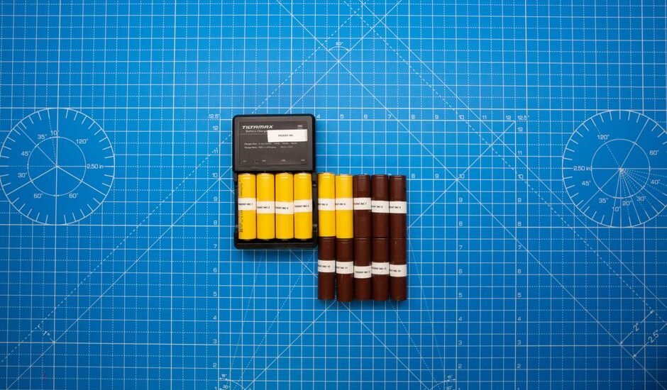 Image showing battery cells in a case, relevant to floating charge in off-grid power.