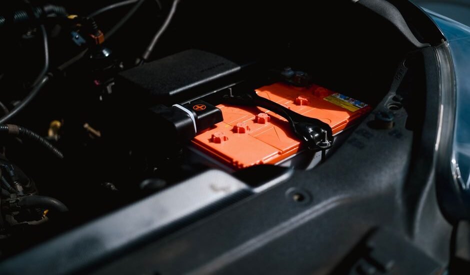 A lithium battery in a vehicle engine compartment, relevant for winterizing tips.