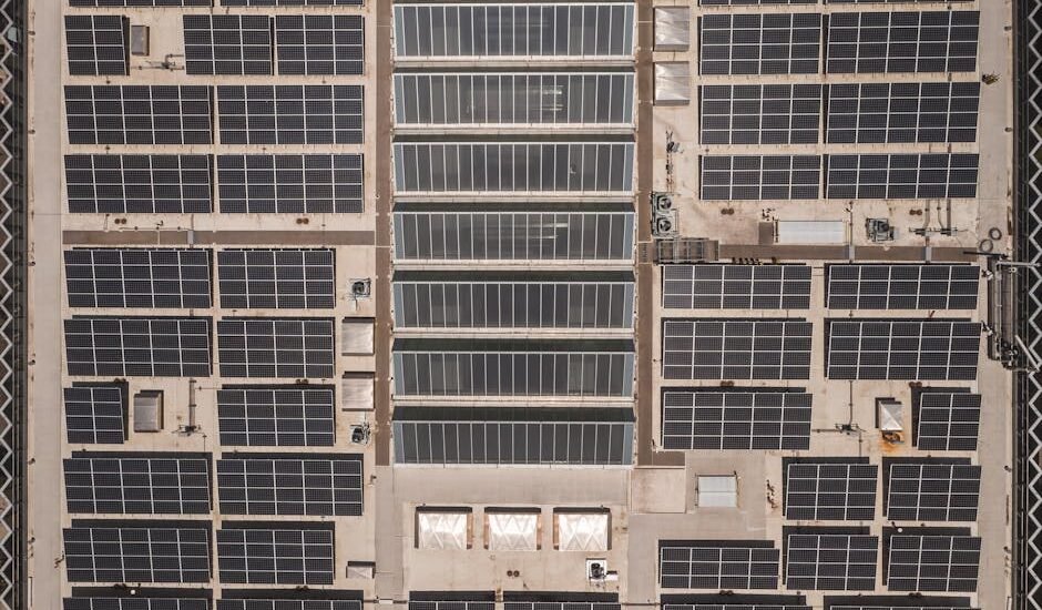 Aerial view of a large solar panel installation, illustrating potential mismatch losses in solar energy systems.