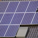 Solar panels installed on a roof, relevant to lithium battery vs supercapacitor discussion.