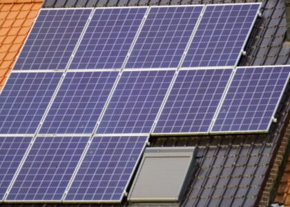 Solar panels installed on a roof, relevant to lithium battery vs supercapacitor discussion.