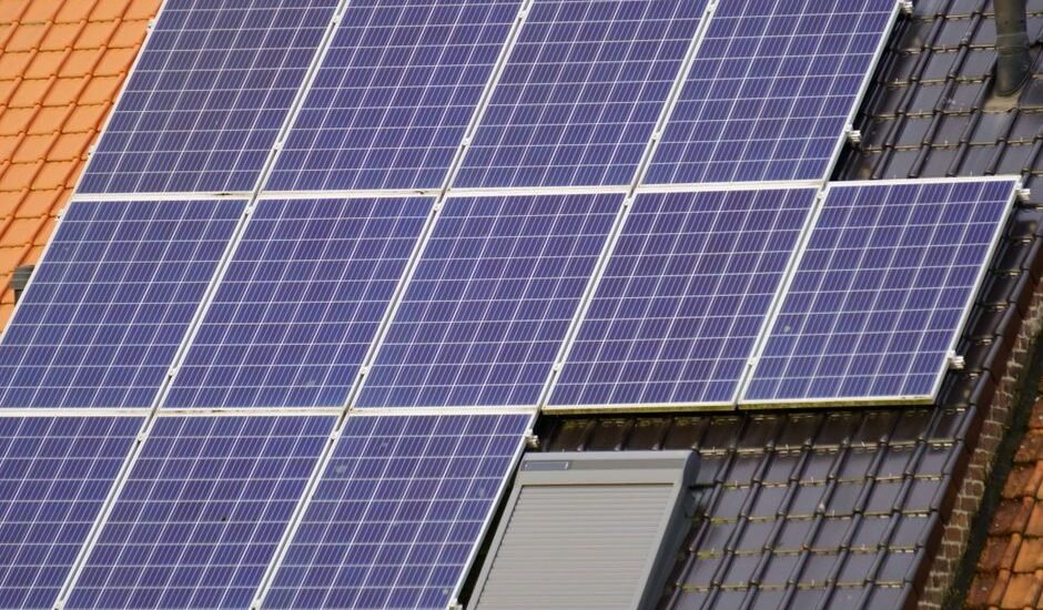 Solar panels installed on a roof, relevant to lithium battery vs supercapacitor discussion.