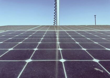 Image showing solar panels with visible wear, relating to efficiency degradation over time.