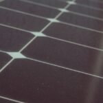 Image showing a close-up view of solar panel cells, relevant to solar panel degradation rates.